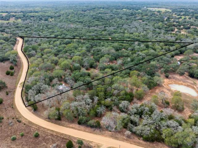 an aerial view of house with outdoor space