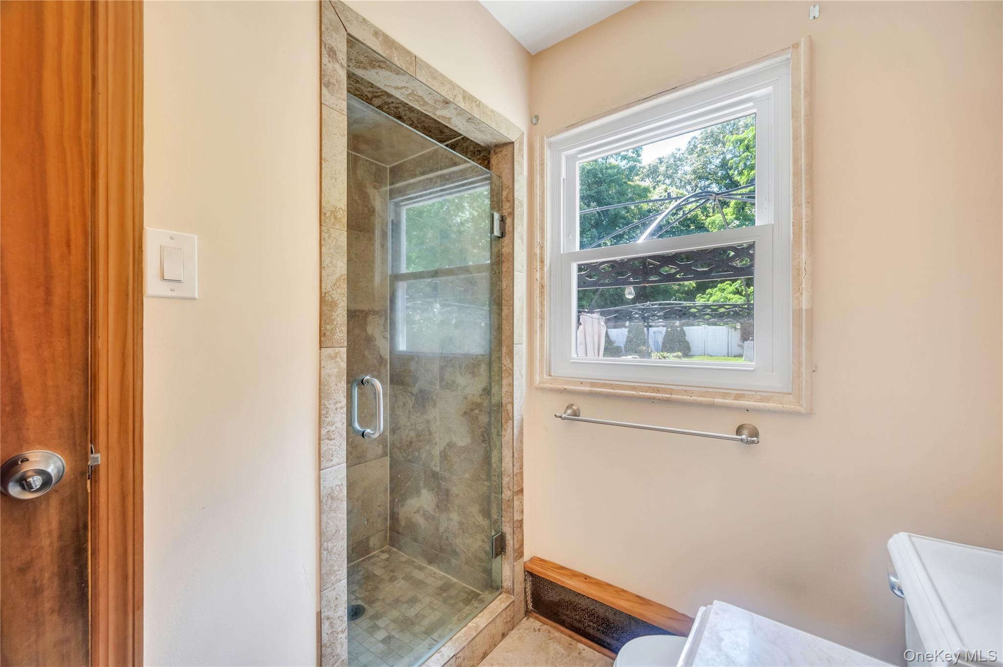 8 Brenner Road Coram, NY 11727 - Photo 13 of 18 Bathroom featuring toilet and a stall shower