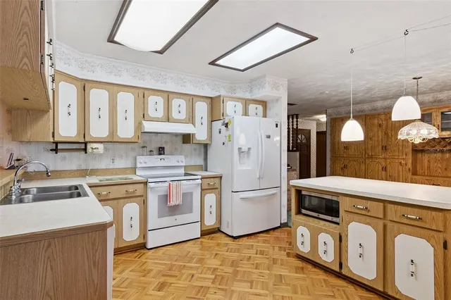 a view of a hallway with windows