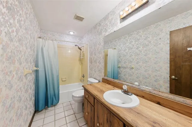 a view of swimming pool with a yard