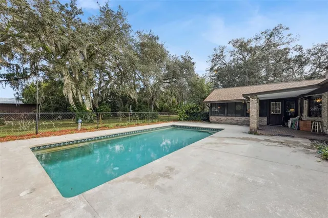 a view of a large body of water with a building in the background