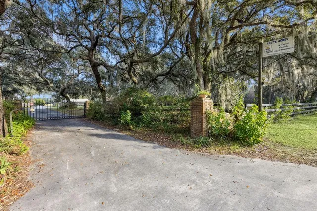 a view of a lake with a yard