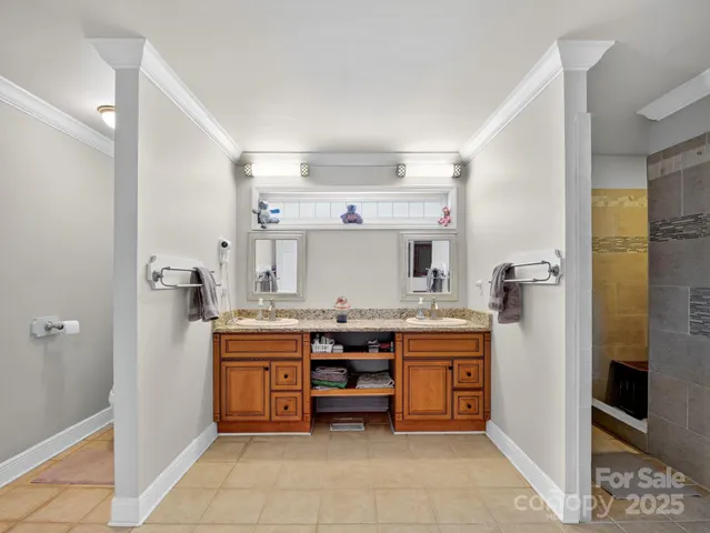 a kitchen with a stove top oven and cabinets