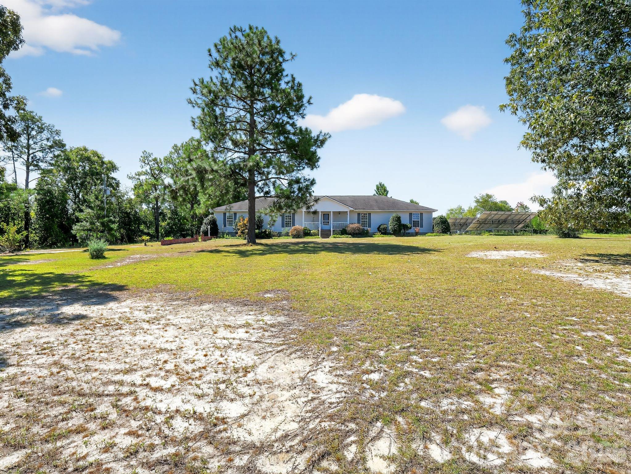 1035 McMillan Road Cheraw, SC 29520 - Photo 28 of 30 a view of a swimming pool and an outdoor space