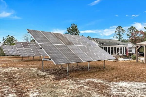 a terrace with a table and chairs