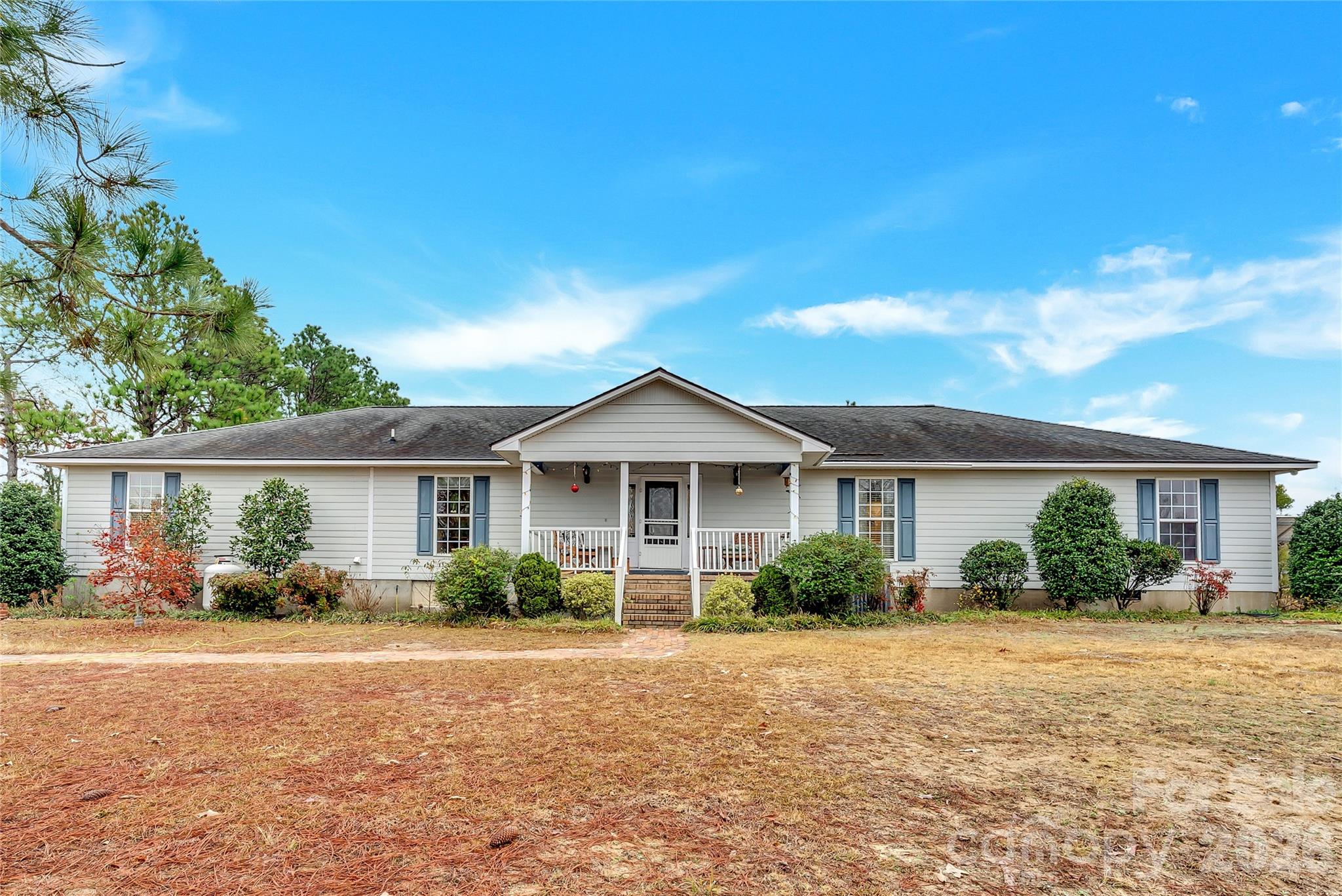 1035 McMillan Road Cheraw, SC 29520 - Photo 3 of 30 a front view of a house with garden