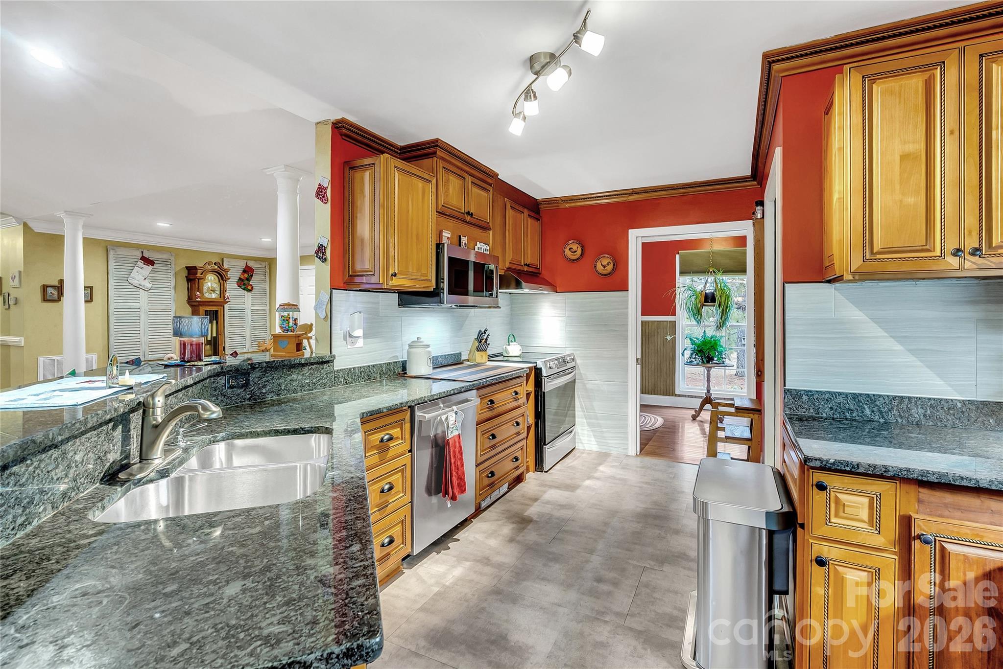 1035 McMillan Road Cheraw, SC 29520 - Photo 8 of 30 a large kitchen with stainless steel appliances granite countertop a sink and a counter space