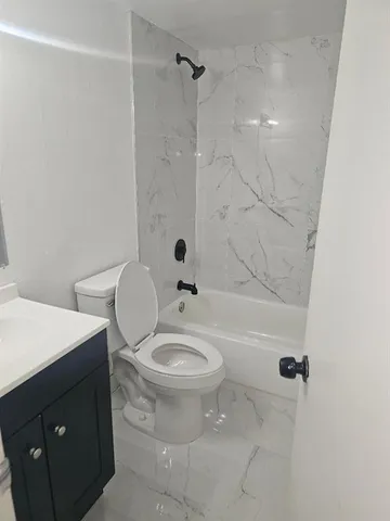 a view of a wrought iron fences in front of house