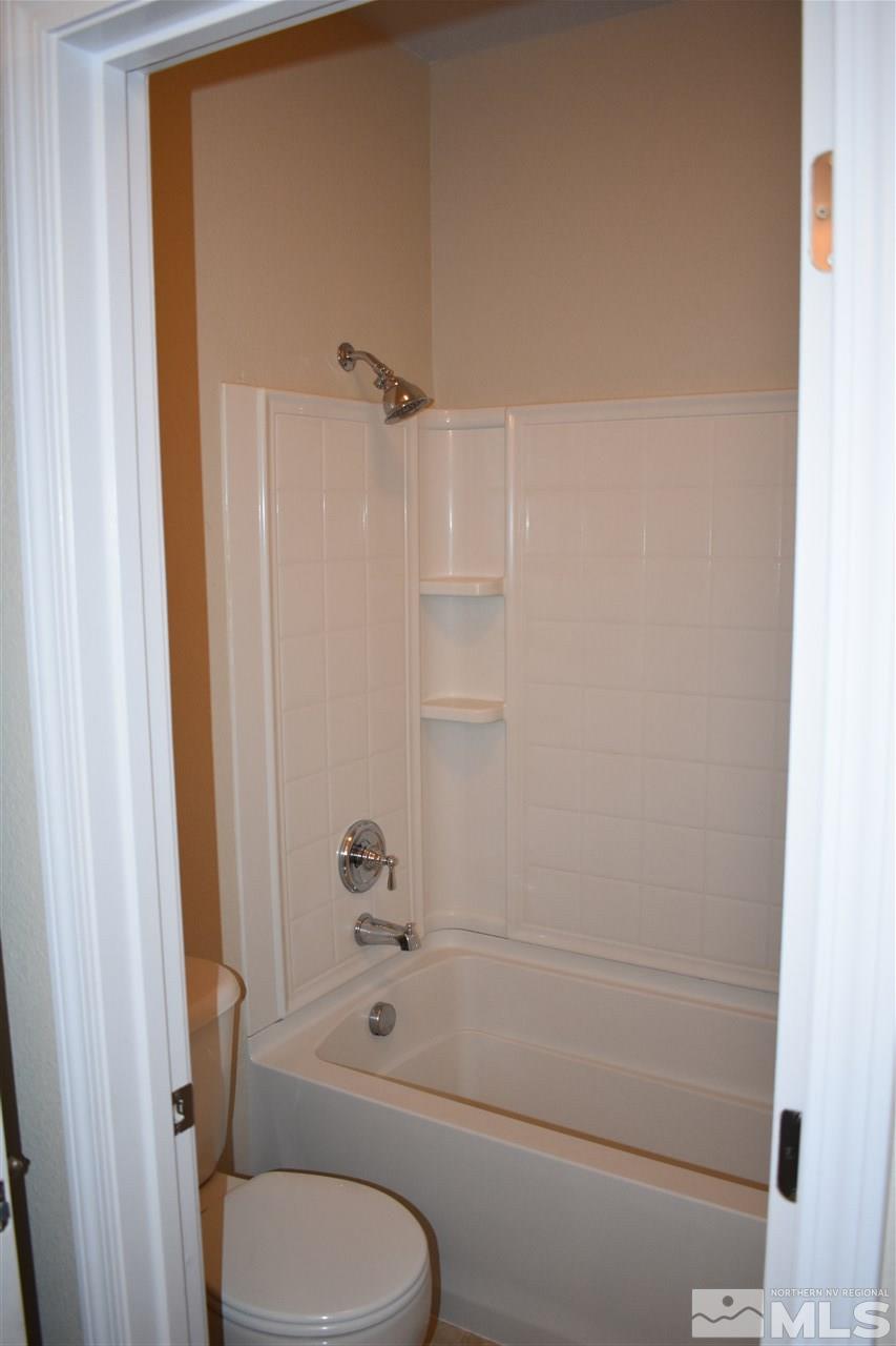 1845 Thousand Acres Way Reno, NV 89521 - Photo 16 of 20 a bathroom with a toilet and a shower