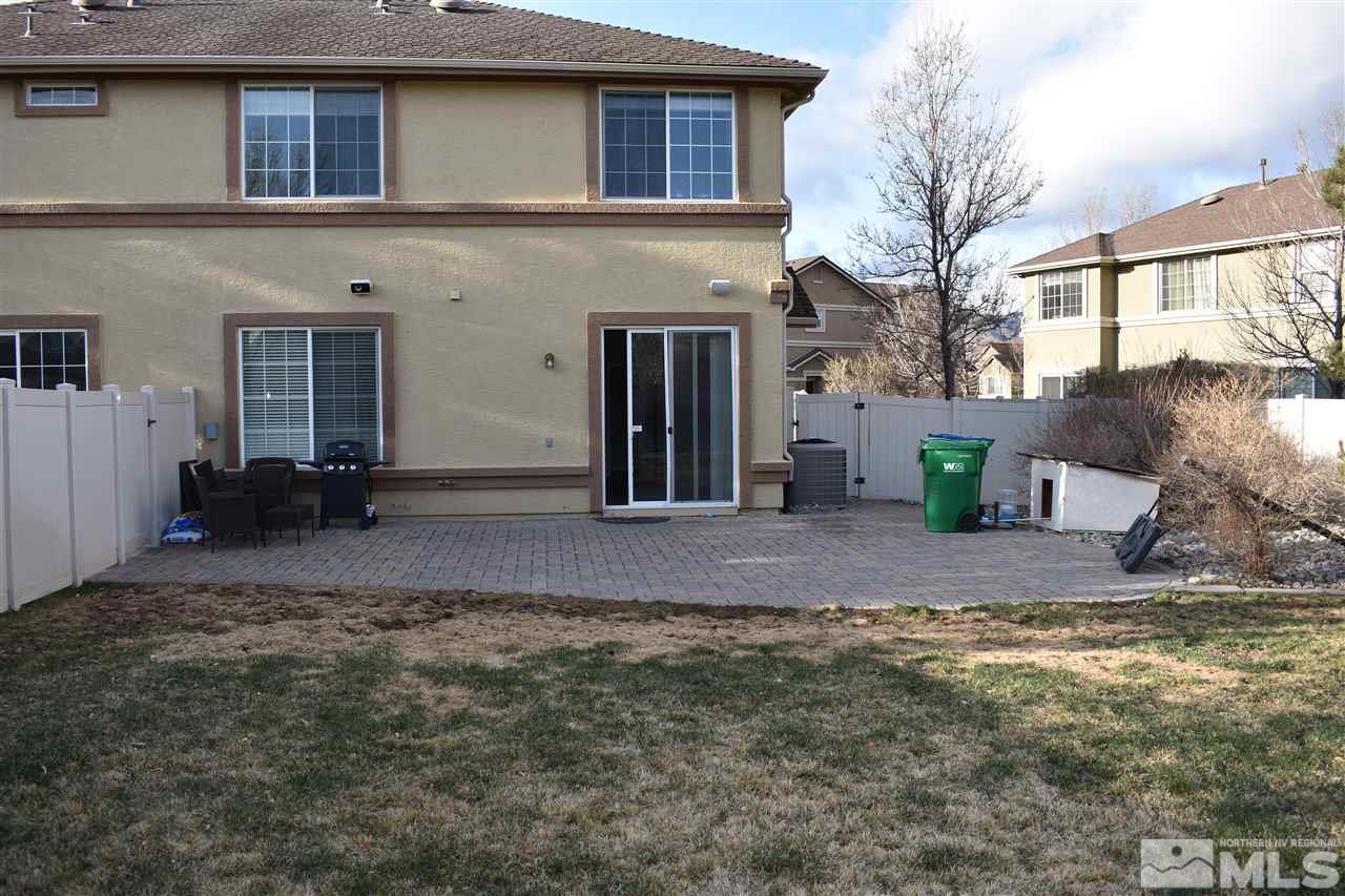 1845 Thousand Acres Way Reno, NV 89521 - Photo 19 of 20 a view of a house with a yard