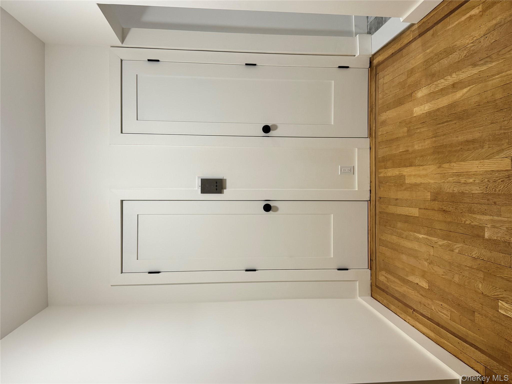 2925 Matthews Avenue, Unit 2H Bronx, NY 10467 - Photo 6 of 6 Detailed view of wood finished floors and baseboards