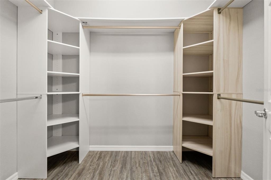 12653 Palapa Loop Spring Hill, FL 34610 - Photo 29 of 50 a view of walk in closet with empty racks