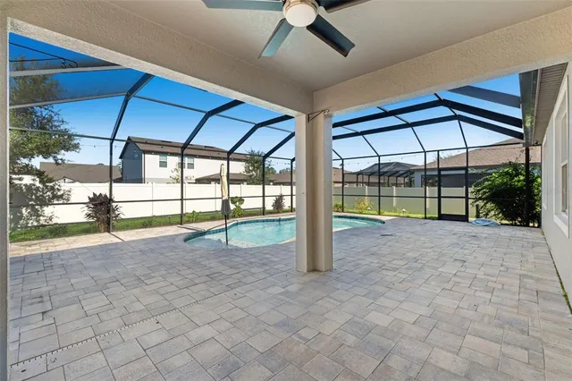 a view of a livingroom with a yard and porch