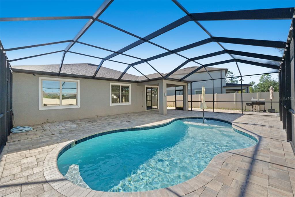 12653 Palapa Loop Spring Hill, FL 34610 - Photo 35 of 50 a view of a backyard