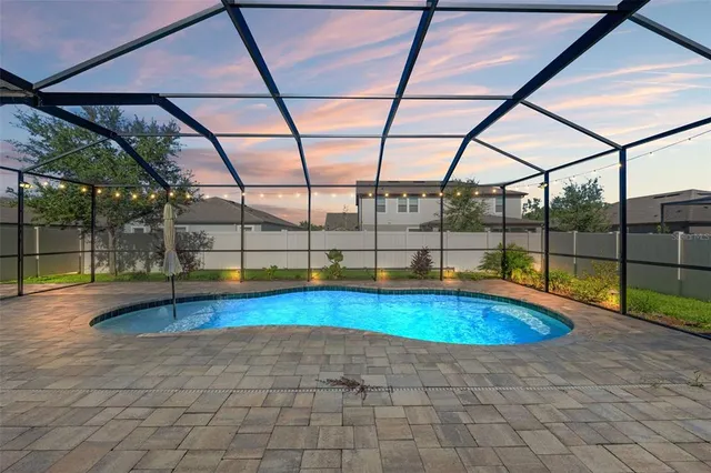 a view of outdoor space with swimming pool