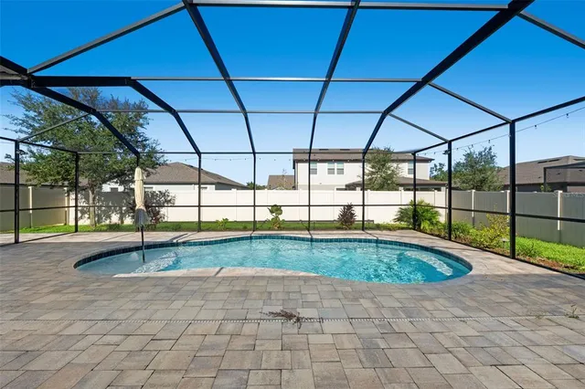 a view of outdoor space with swimming pool