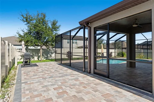 a view of a backyard of the house
