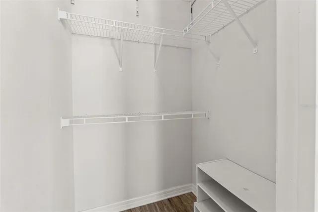 a view of a room with racks on the wall