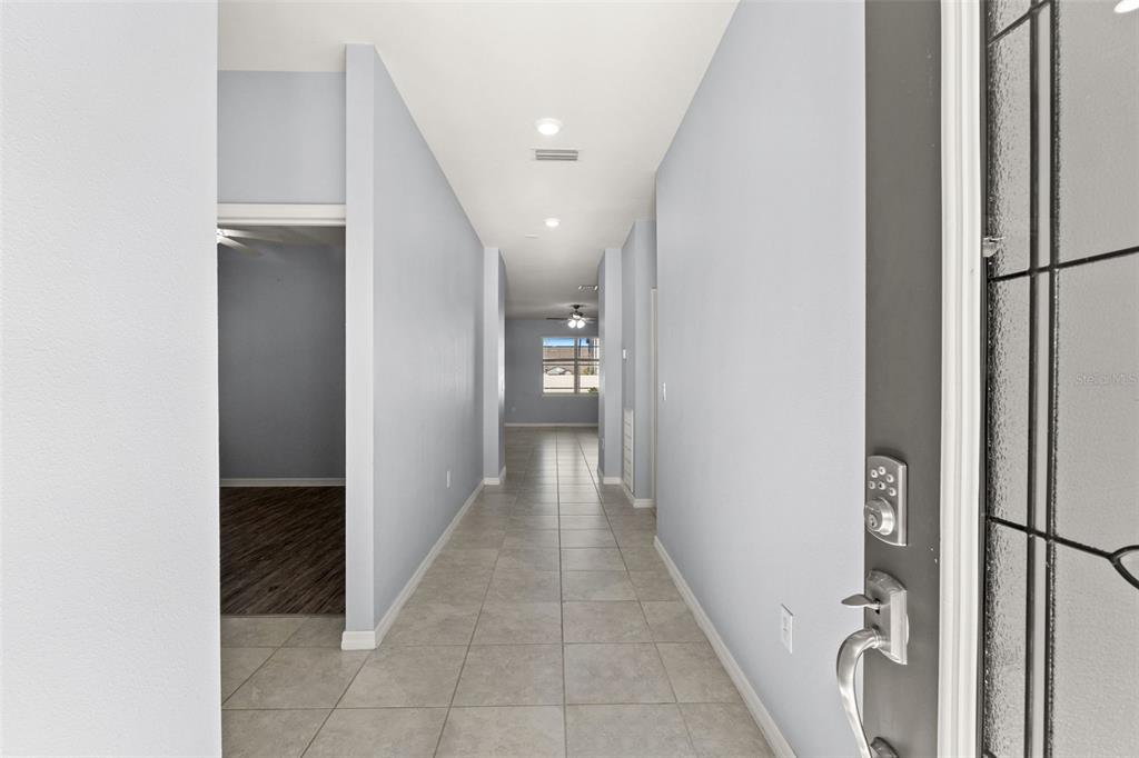 12653 Palapa Loop Spring Hill, FL 34610 - Photo 7 of 50 a view of a hallway