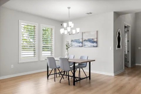 a kitchen with a sink stove and microwave
