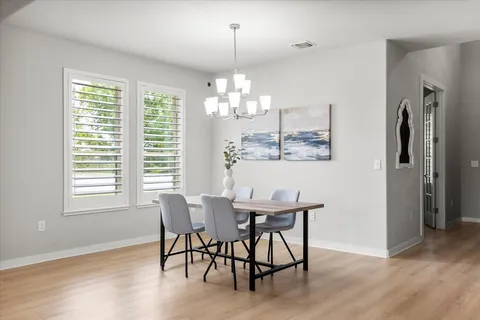 a kitchen with a sink stove and microwave
