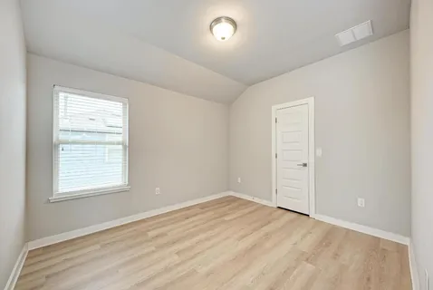 a bathroom with a sink a toilet a shower and a mirror