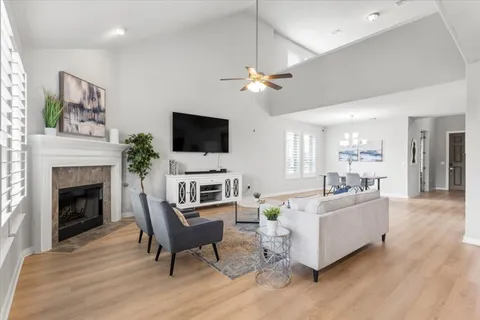 an aerial view of a house with a swimming pool