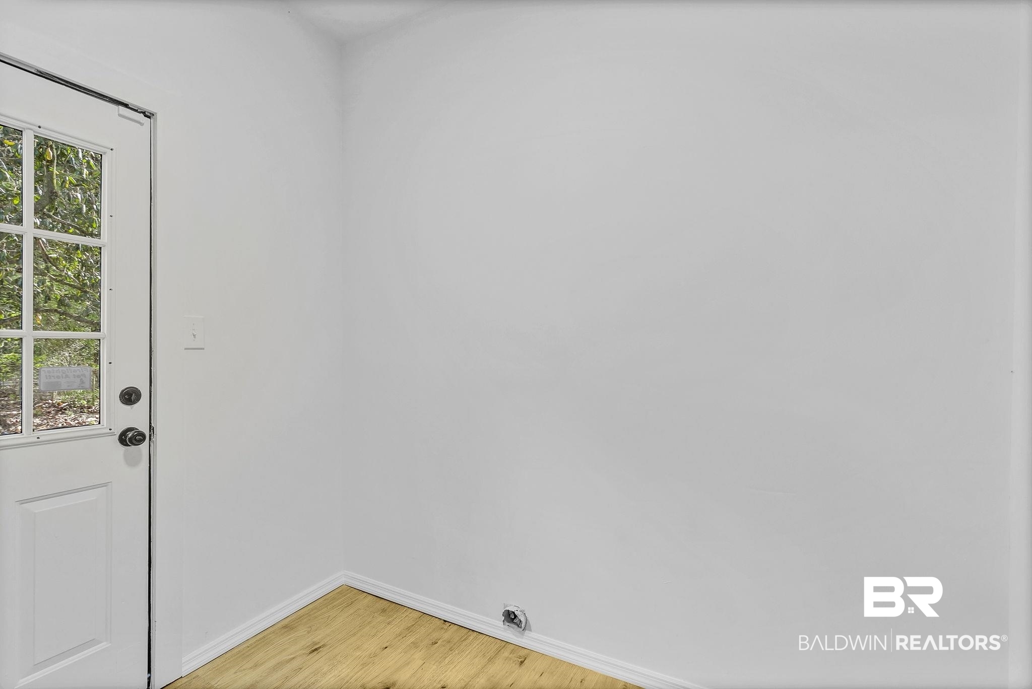 203 Anderson Road Saraland, AL 36571 - Photo 20 of 48 Entryway with light wood-type flooring and baseboards