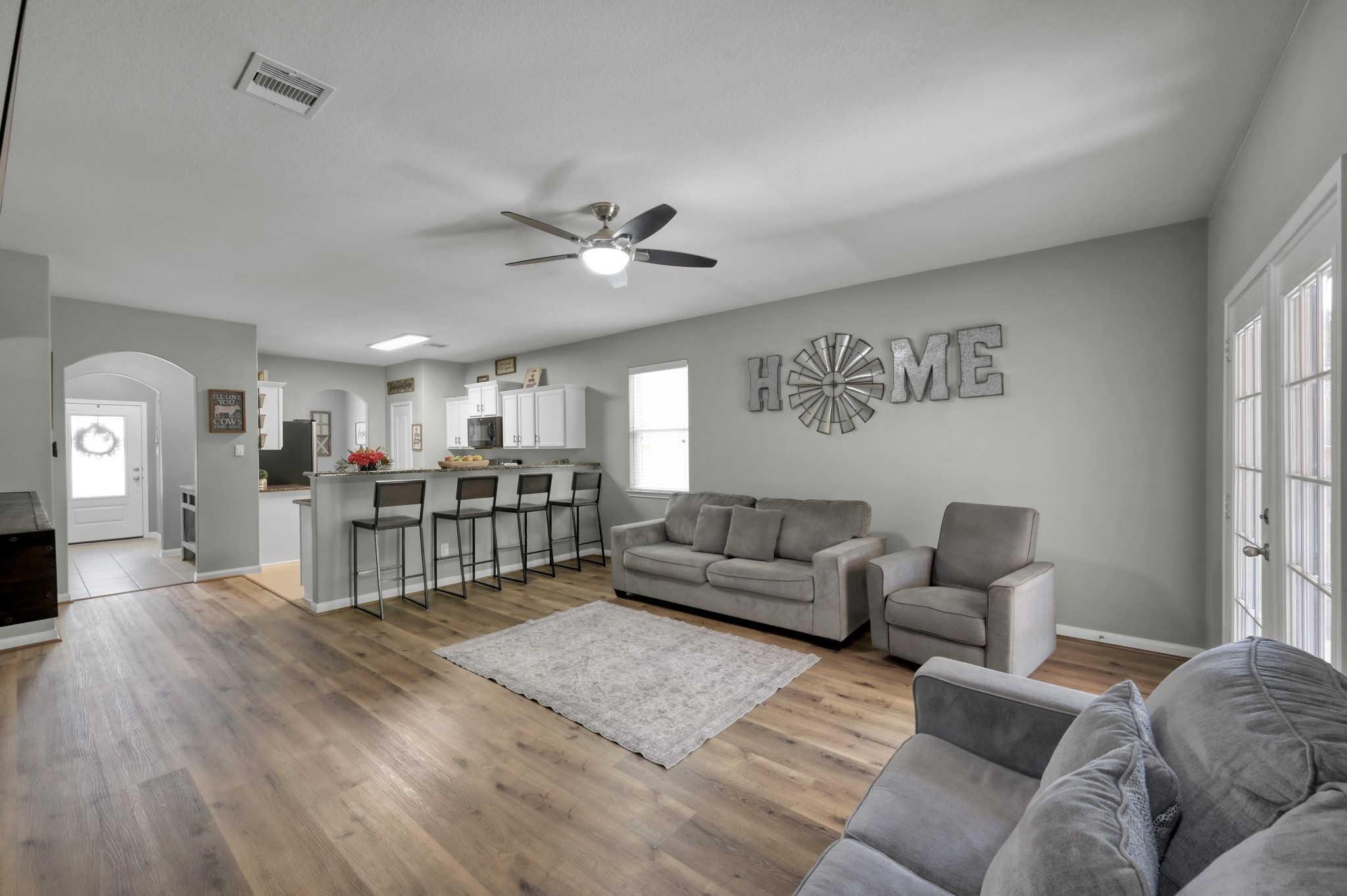 7562 Fettle Lane Conroe, TX 77304 - Photo 15 of 30 Expansive living space with modern finishes and versatile layout options.