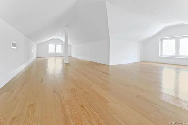 a view of work space with kitchen and living room