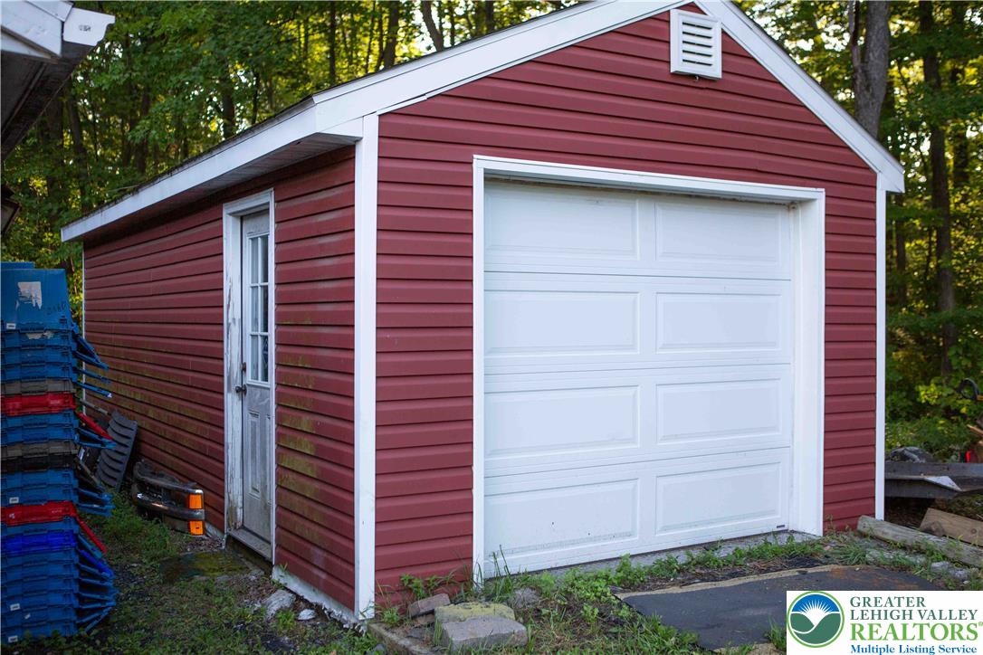8657 South Loop Road Slatington, PA 18080 - Photo 18 of 32 Amish built 24 x 12 shed with electricity for extra workshop space.