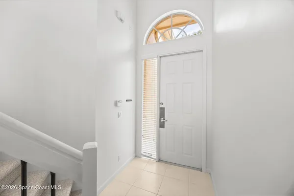 a view of a room that has a large window