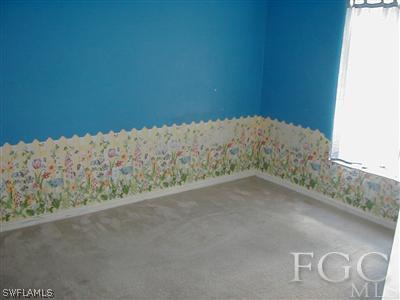8382 Butternut Road Fort Myers, FL 33967 - Photo 6 of 10 a view of wooden floor and a window