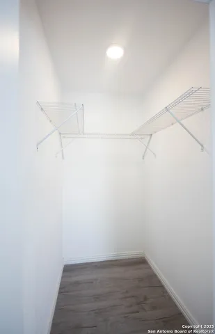 a view of a room with racks on the wall
