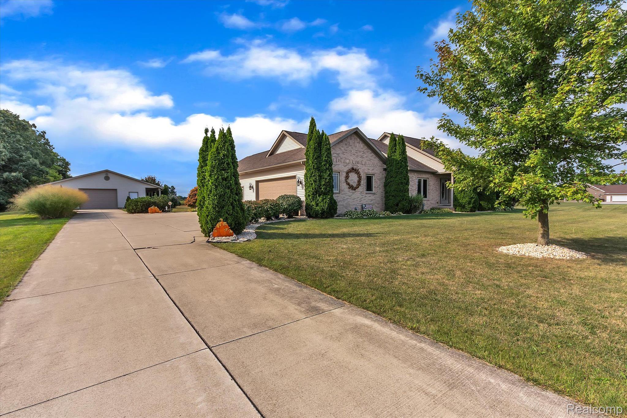 2269 West Sigler Road Carleton, MI 48117 - Photo 2 of 59 Full cement driveway from the road to the pole bar