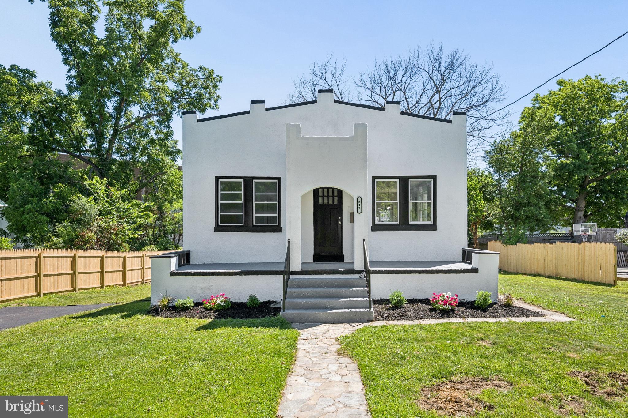 517 Valcour Road Baltimore, MD 21228 - Photo 5 of 47 a front view of house with yard
