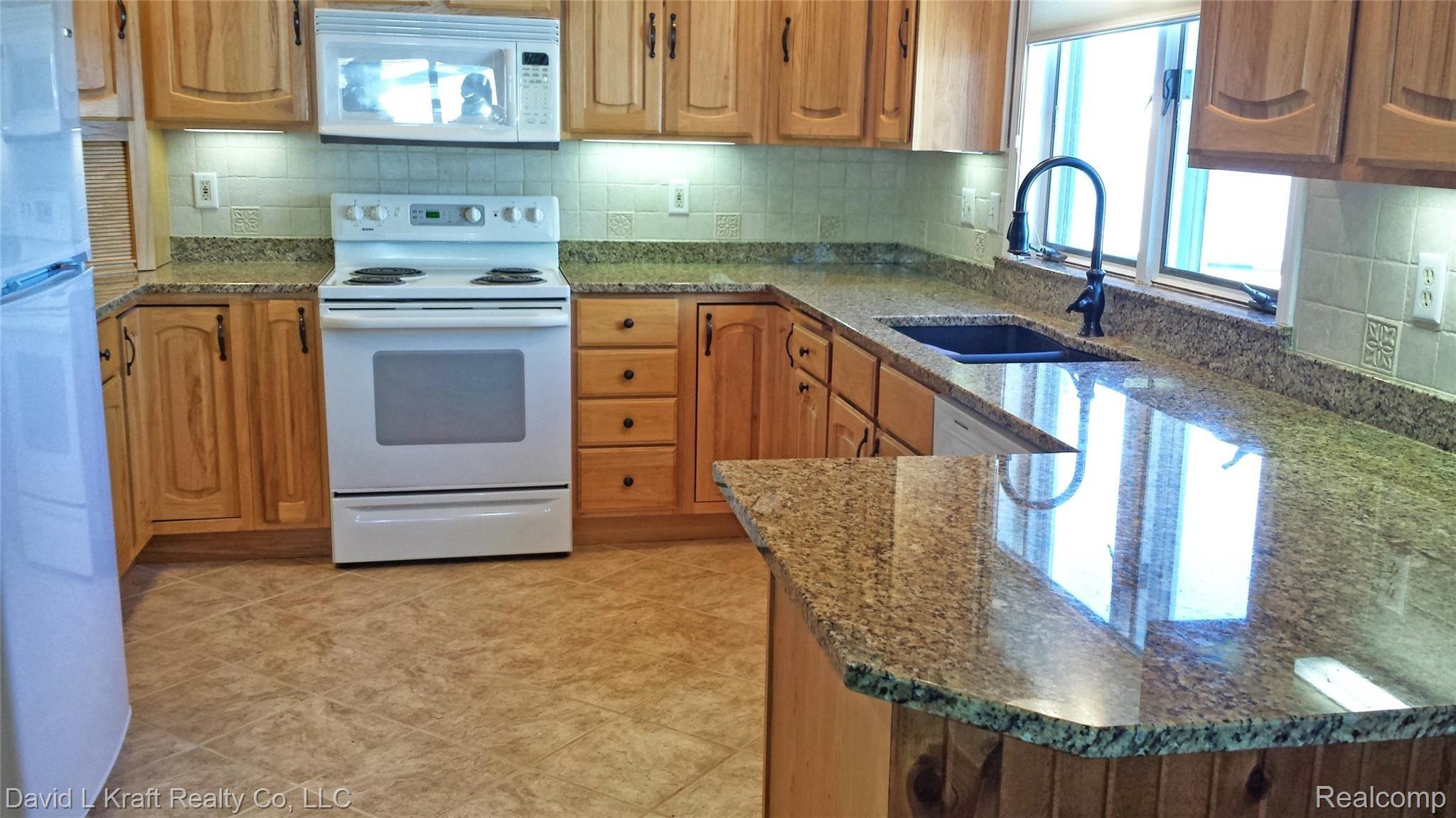 7586 Port Austin Road Pigeon, MI 48755 - Photo 3 of 24 7586PtAustinKitchen.jpg
