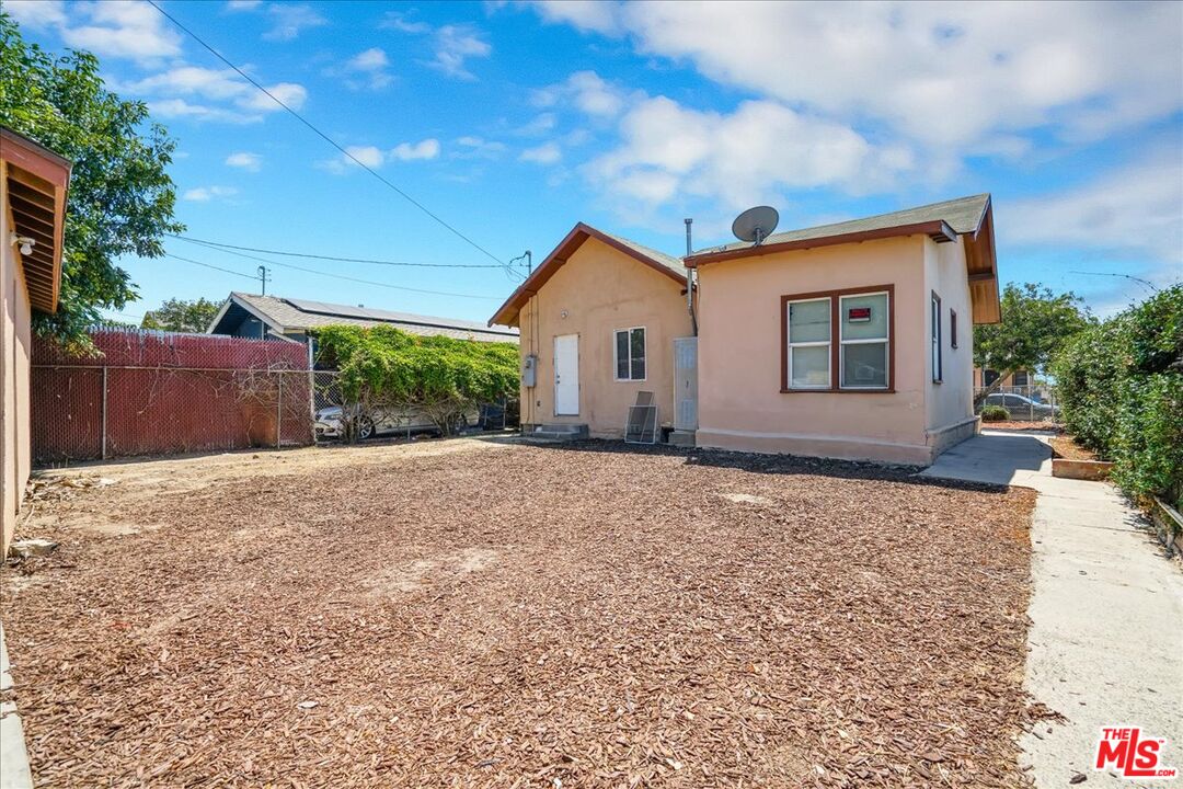 1221 West 152nd Street Compton, CA 90220 - Photo 18 of 20 a house view with a backyard space