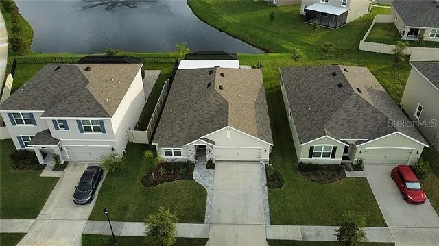 an aerial view of a house with garden