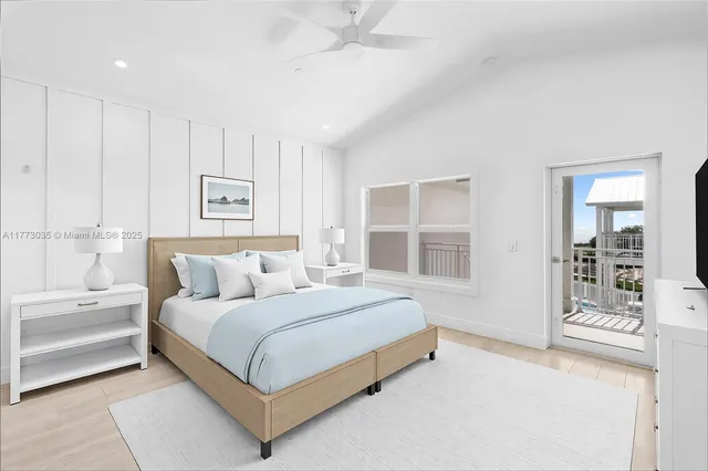 a balcony with furniture and a potted plant