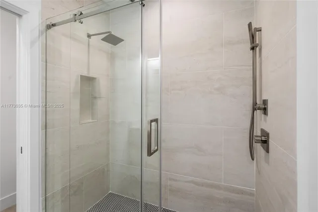 a view of a kitchen with furniture and wooden floor