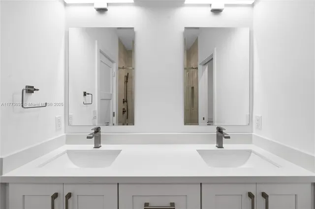 a view of storage and utility room with racks on the wall