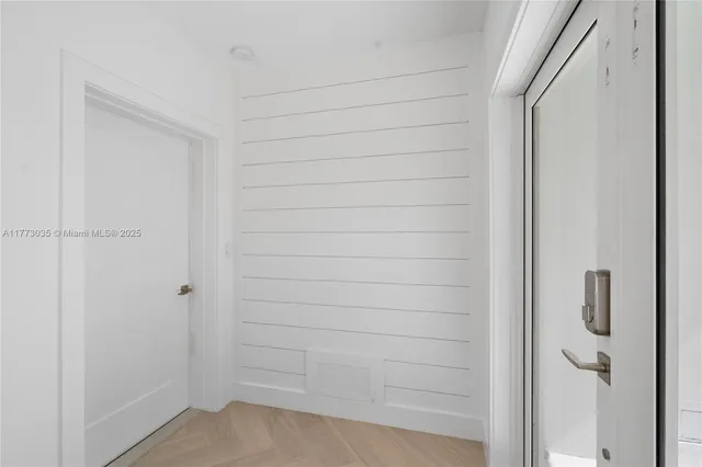 a kitchen with a refrigerator a sink and a stove