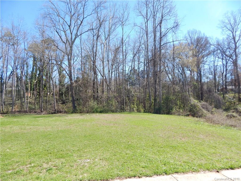 5040 Elizabeth Road Charlotte, NC 28269 - Photo 2 of 6 a view of patio with a yard
