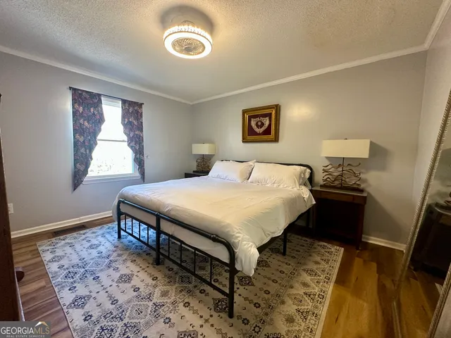 a view of swimming pool from a balcony