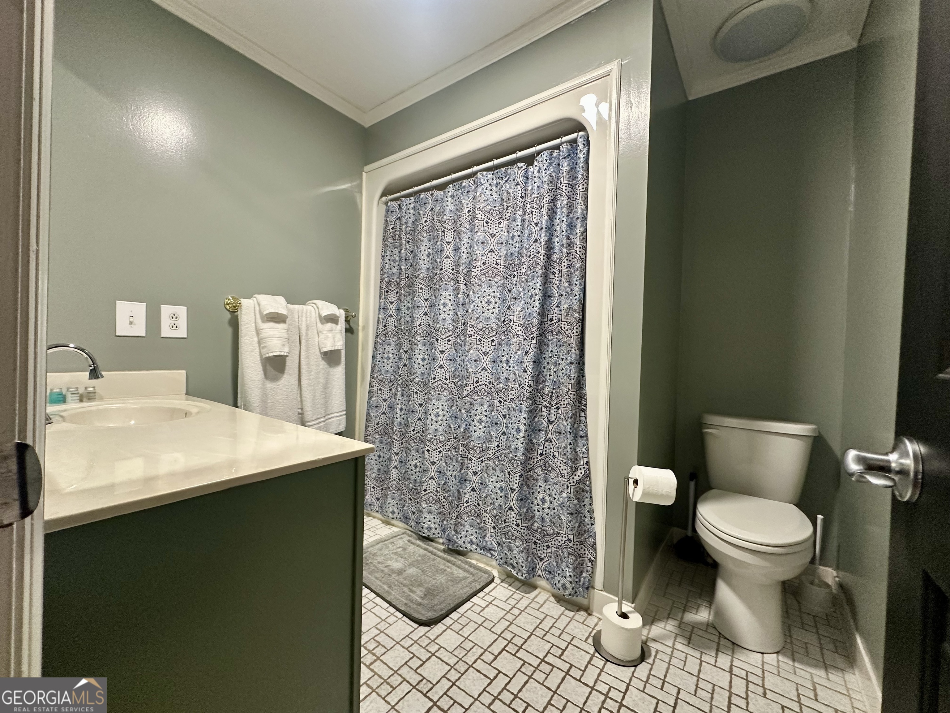 326 Turkey Run Dublin, GA 31021 - Photo 30 of 114 a bathroom with a sink toilet and shower