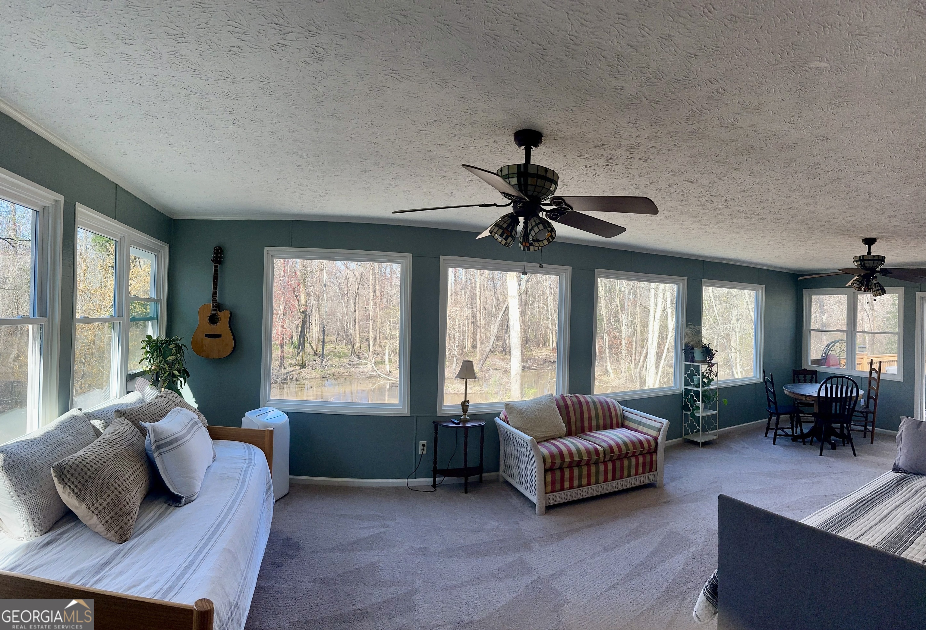 326 Turkey Run Dublin, GA 31021 - Photo 36 of 114 a living room with furniture and a large window
