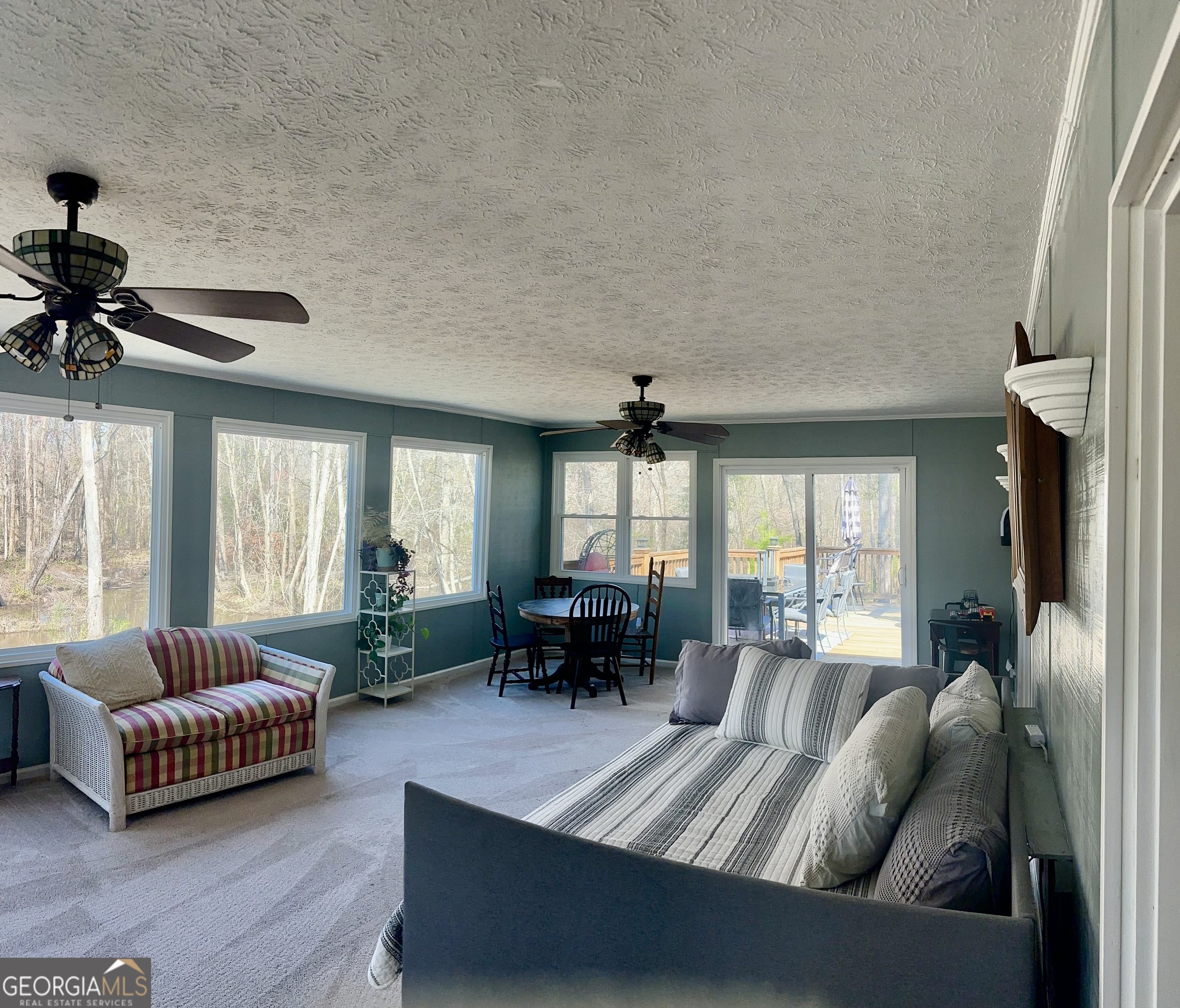 326 Turkey Run Dublin, GA 31021 - Photo 39 of 114 a living room with furniture and a large window