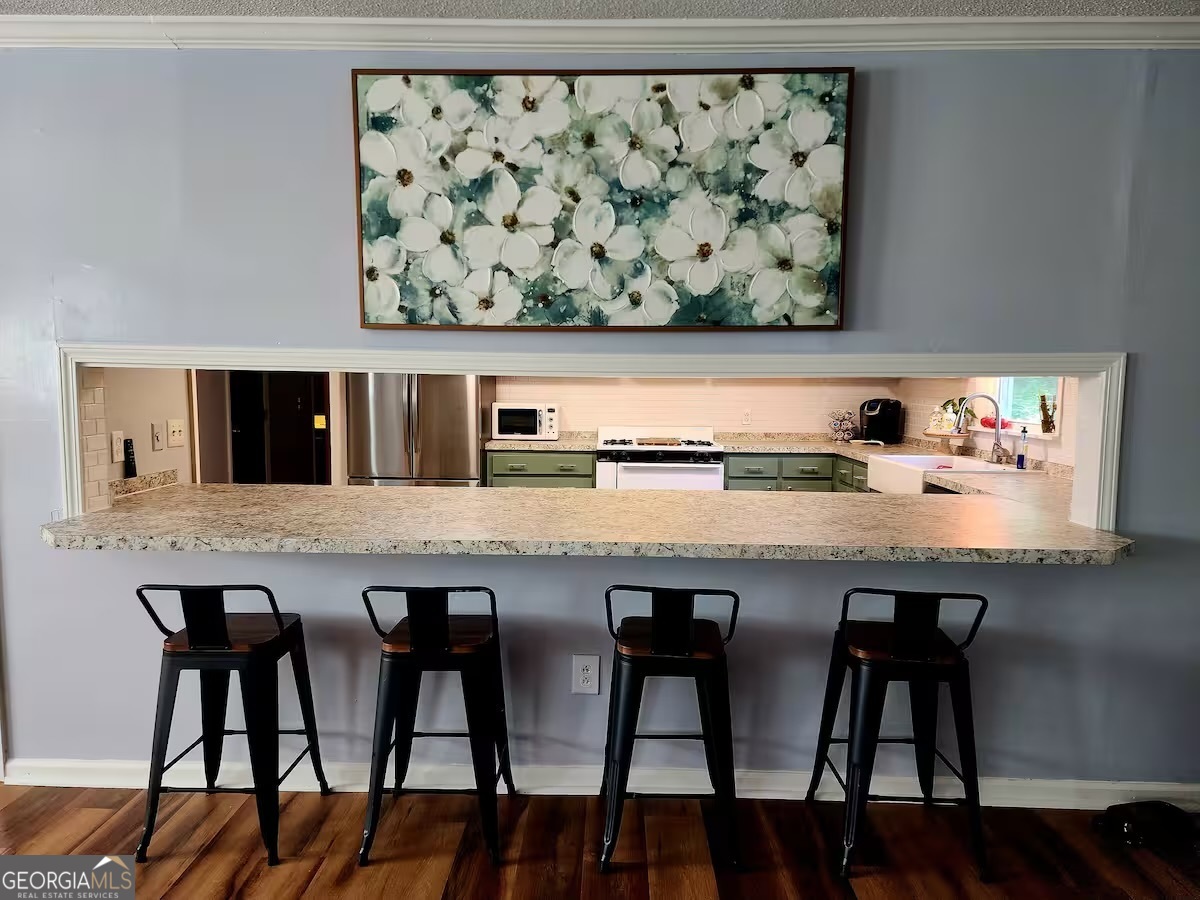 326 Turkey Run Dublin, GA 31021 - Photo 73 of 114 a kitchen with a table and chairs in it