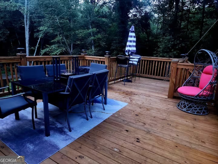 326 Turkey Run Dublin, GA 31021 - Photo 78 of 114 a view of a chairs and tables on the deck